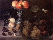 Georg Flegel Still life of grapes on a pewter dish,together with peaches,nuts,a glass roemer and a silver tazza containing apples and pears,and a blue-tit oil on canvas